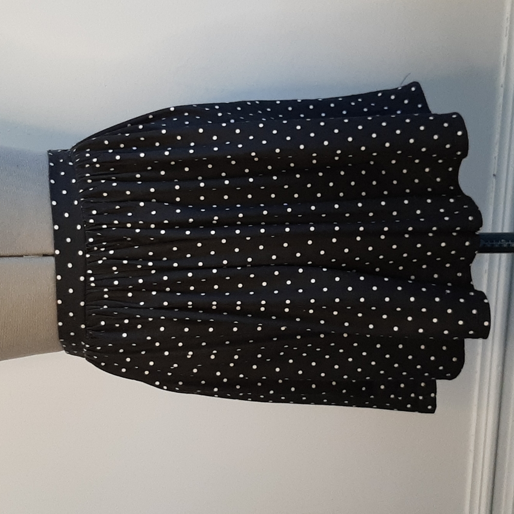 Size extra small, black with white polka dots skirt